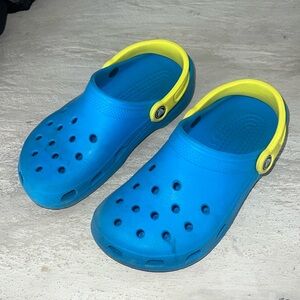 Blue and lime green crocs
